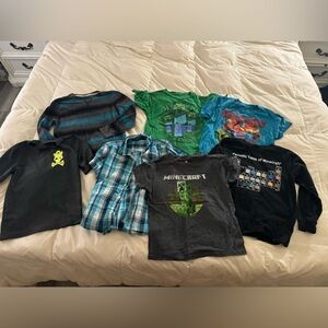 Boys small medium bundle. 2 shirts play condition.